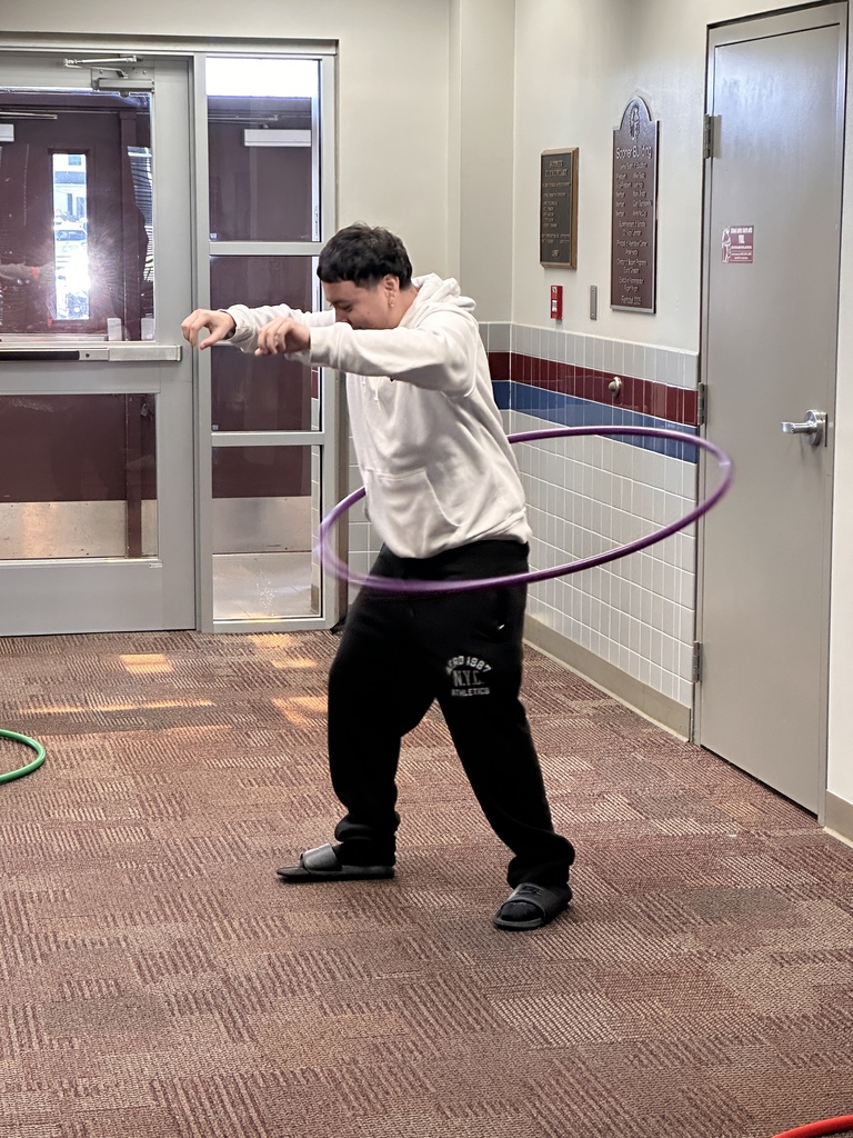 A student hula-hooping