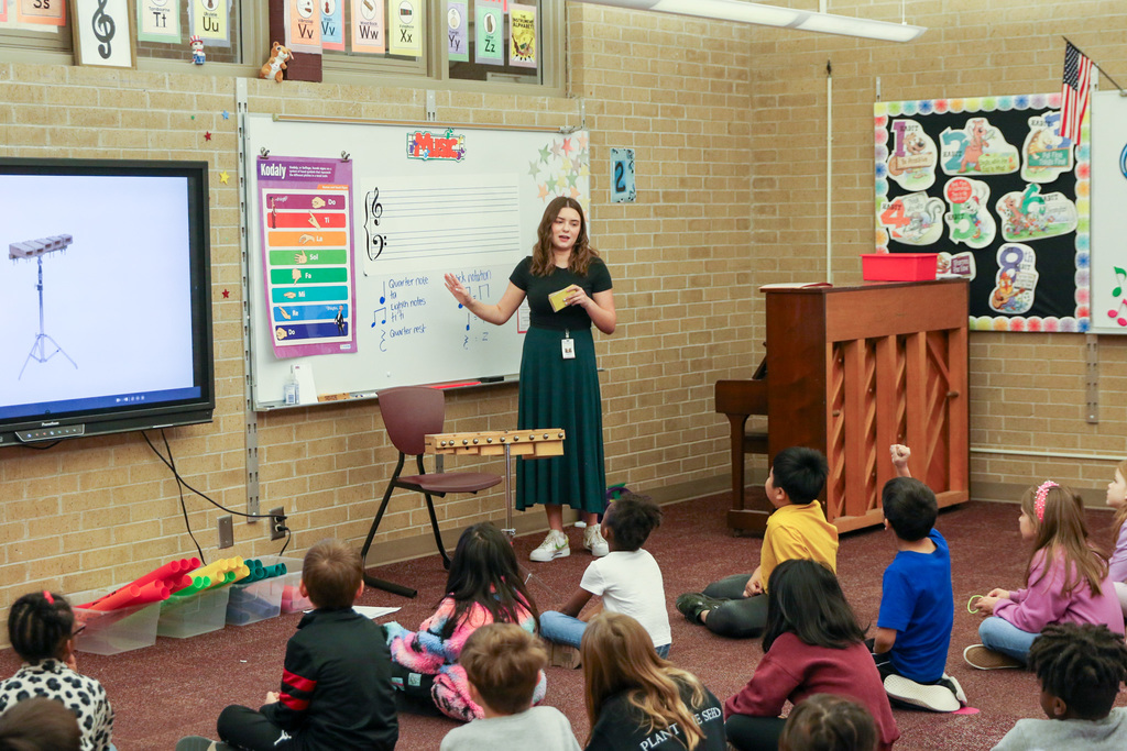 music teacher sounding out notes