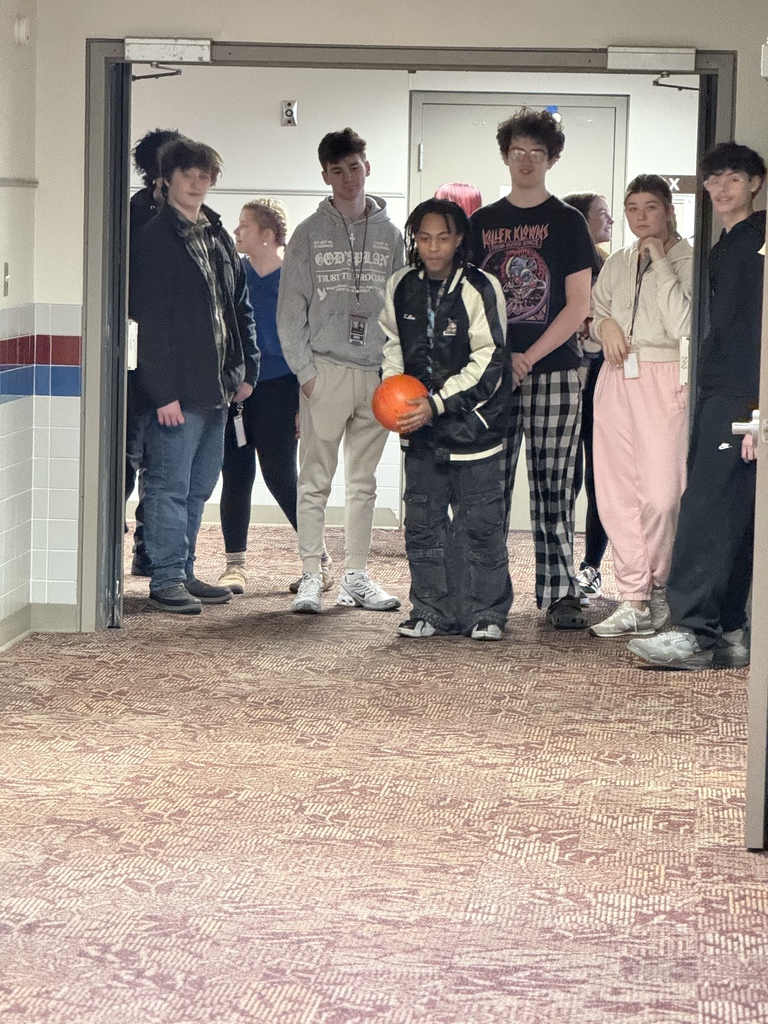 a group of students preparing to bowl