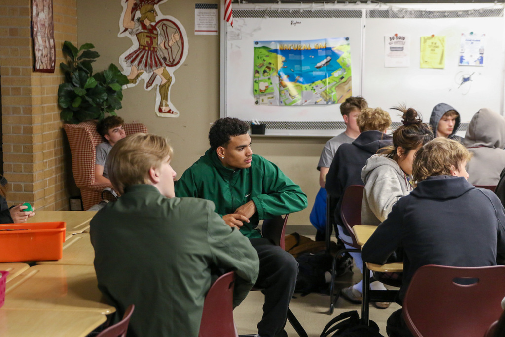 students at their desks learning