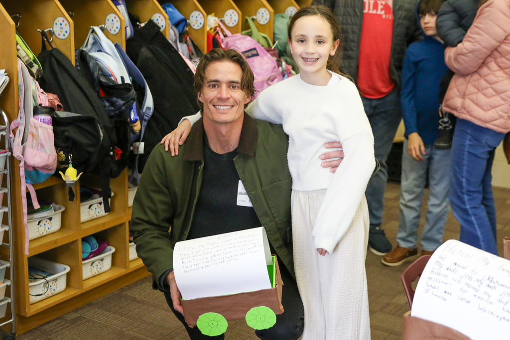 father and daughter with the wagon made by the daughter