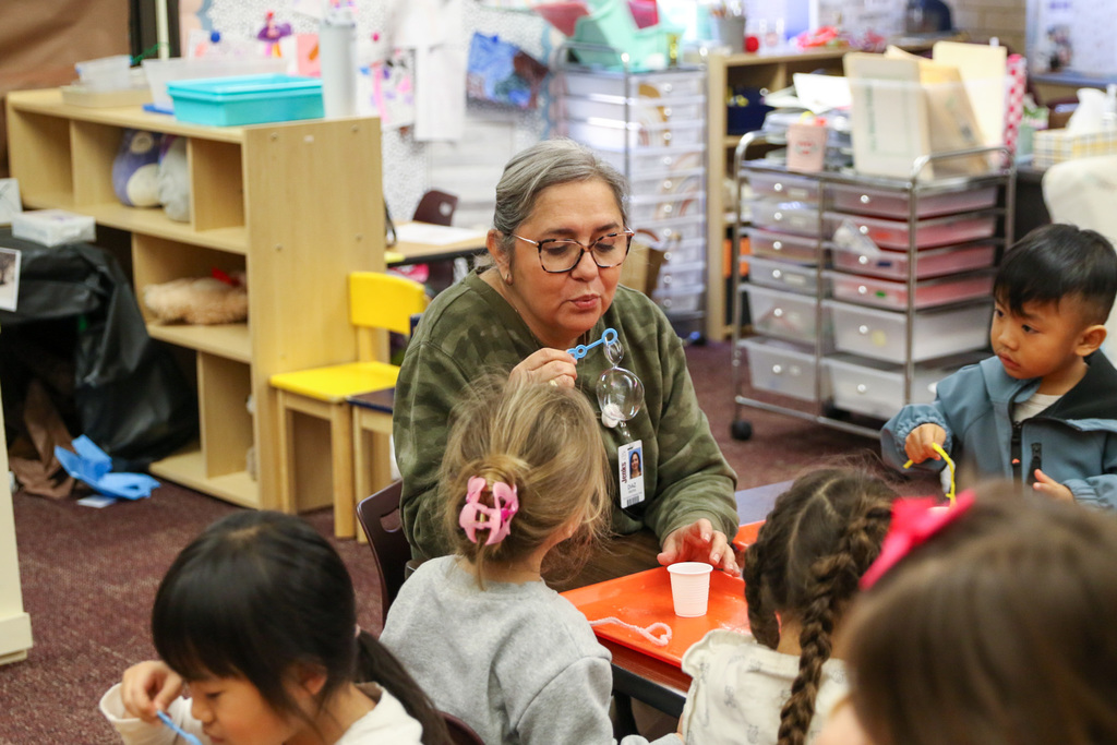 teacher blowing bubbles