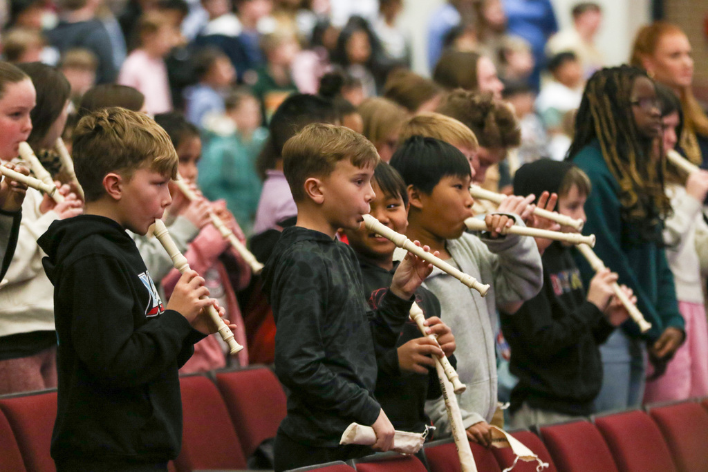 boys playing the recorder