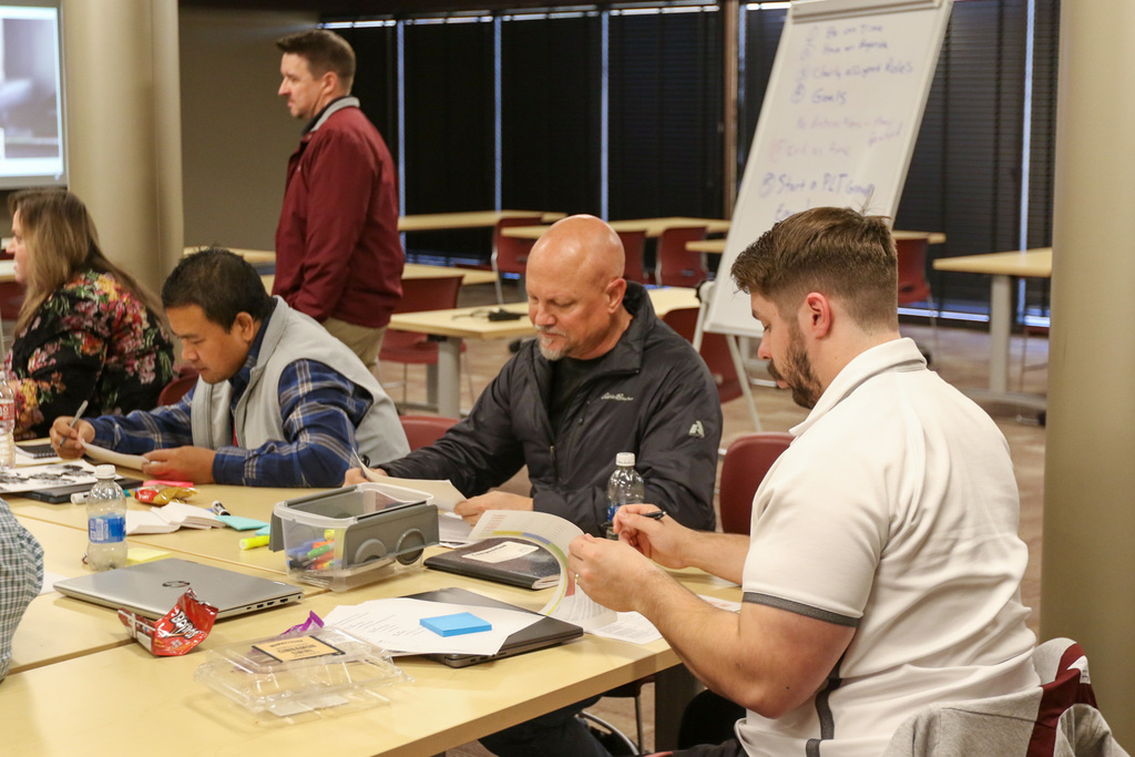 math teachers reading over documents