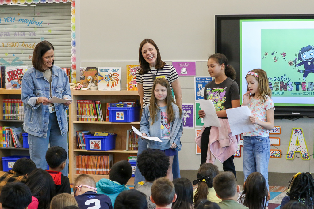 students acting out scense from her book