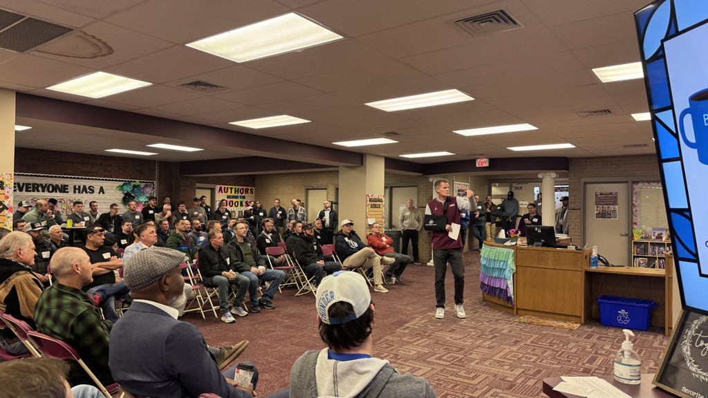 Athletic Director, Clay Martin, speaking to a group of dads at Dynamic Dads