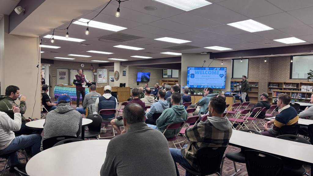 Athletic Director, Clay Martin, speaking to a group of dads at Dynamic Dads