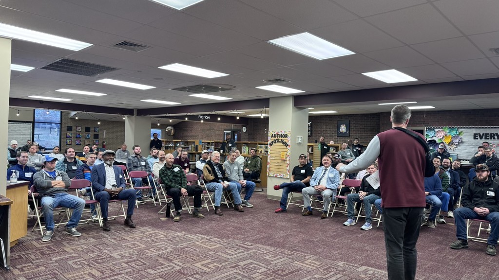 Athletic Director, Clay Martin, speaking to a group of dads at Dynamic Dads
