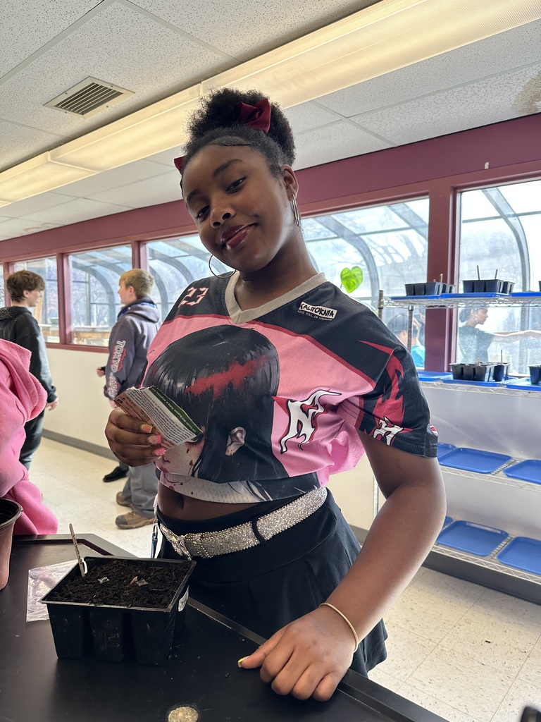 One student with a seed packet
