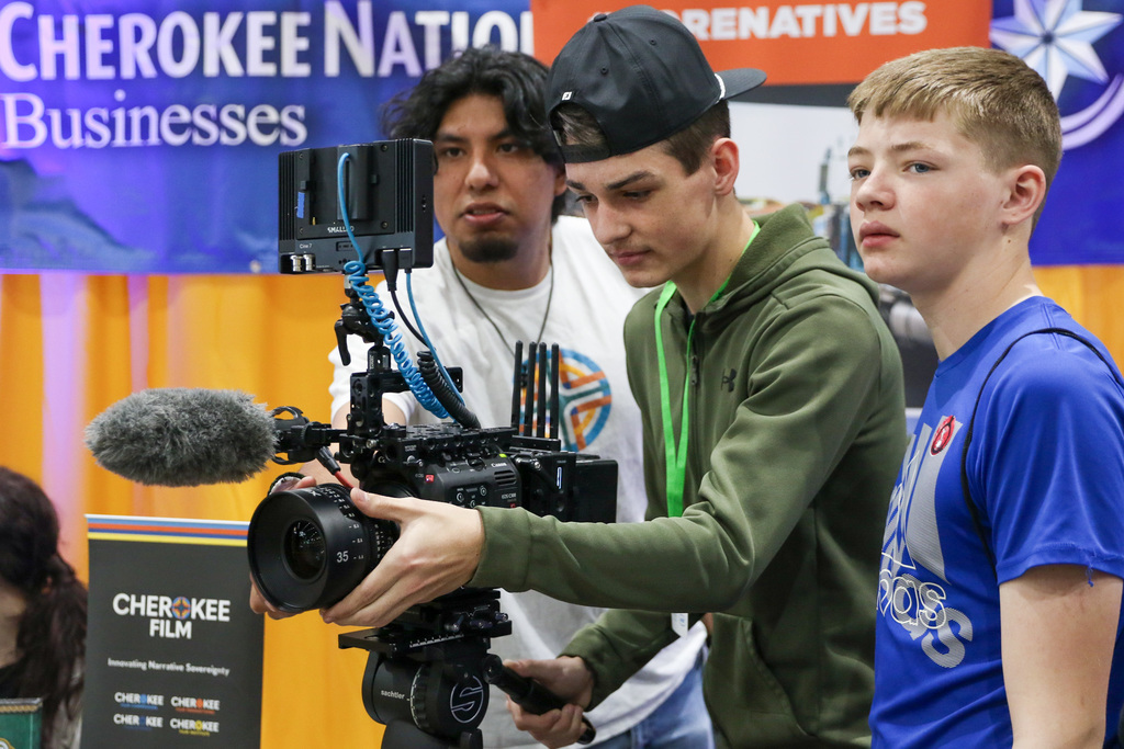 students using a movie capera