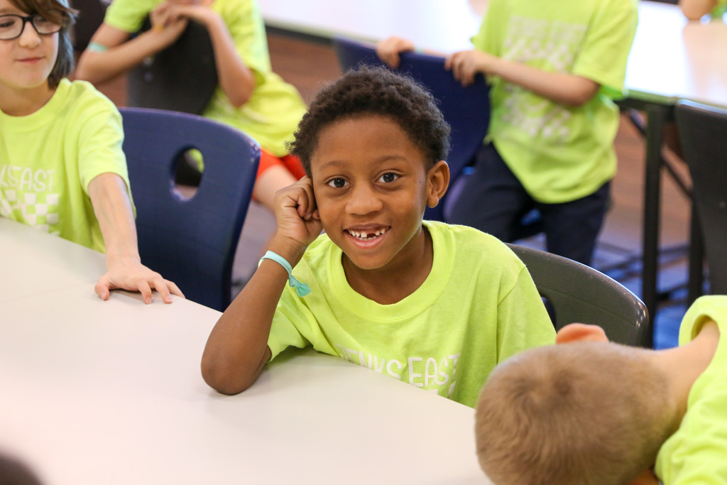 student smiling at the camera