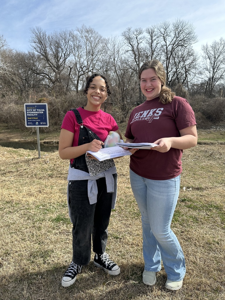 2 students working outside