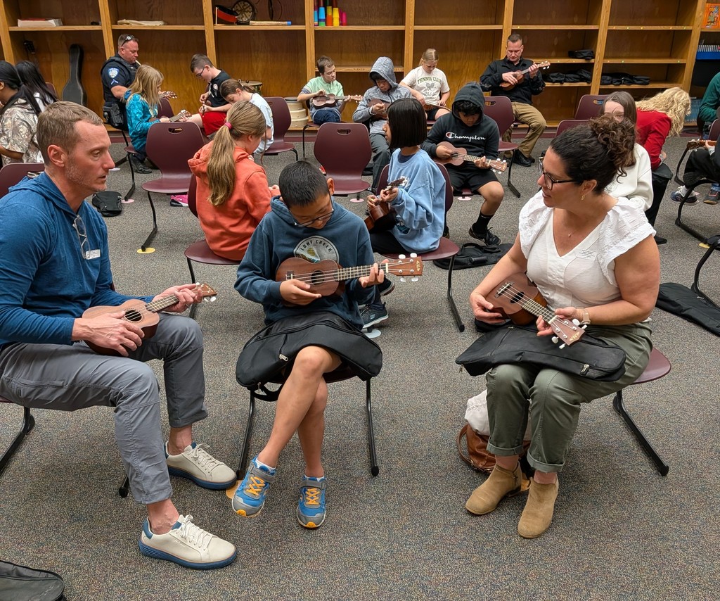 Student and family during Specials with Someone Special (in music).