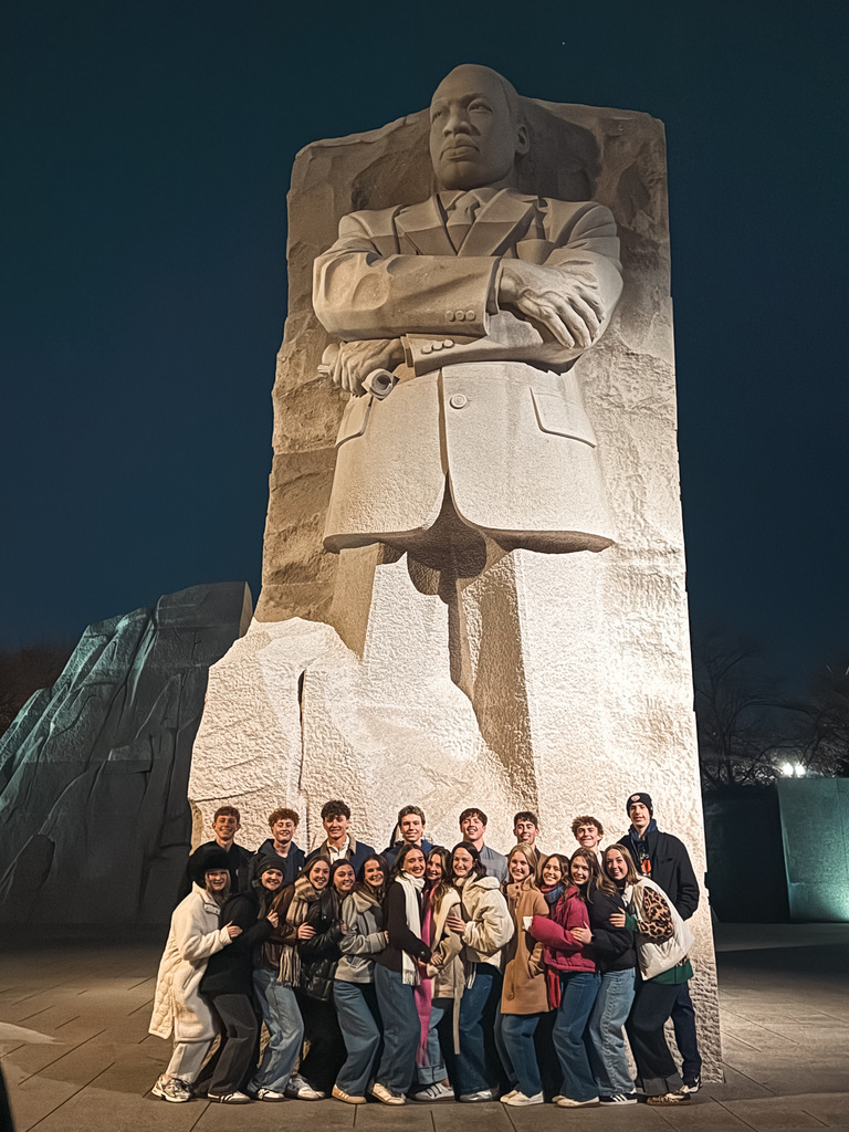 Group of Jenks High School students in front of Martin Luther King, Jr. statue in Washington D.C.