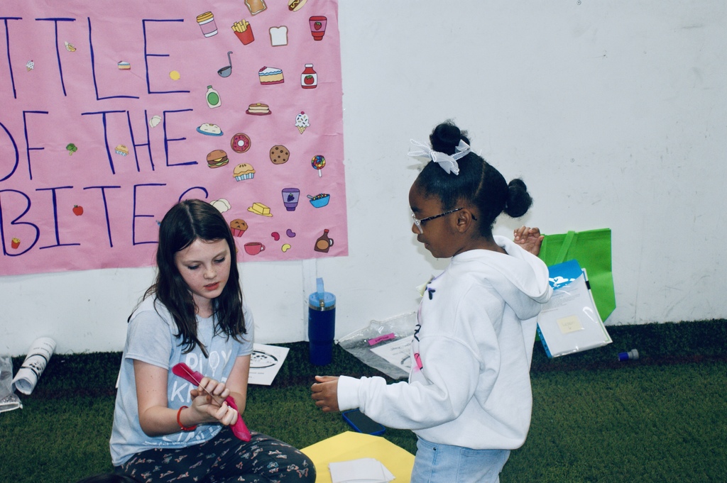 Partners working together on Amazing Athletes challenge.