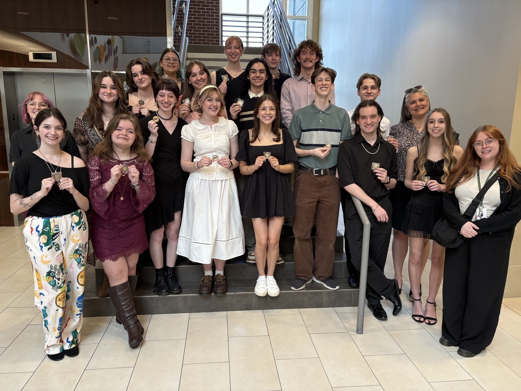 Group photo of Jenks High School Theatre students on staircase