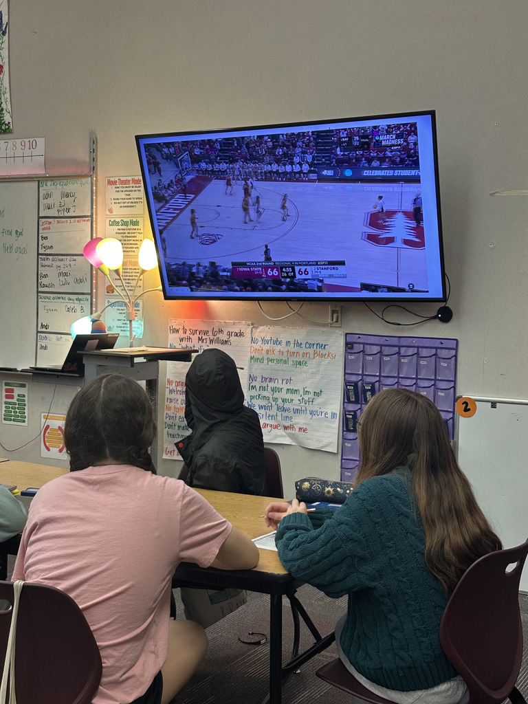 Watching a clip to analyze data from a basketball game to work on math skills.