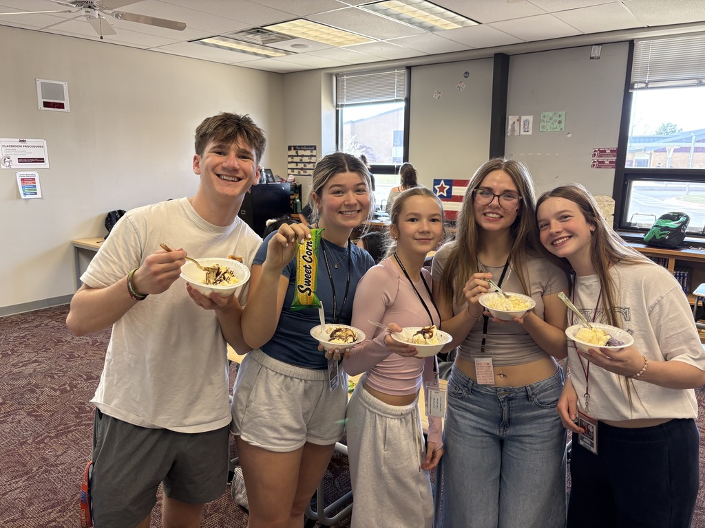 5 students holding their bowls of ice cream