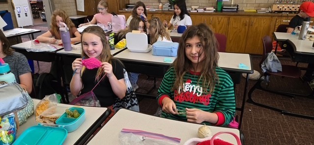 students at the crochet lunch club
