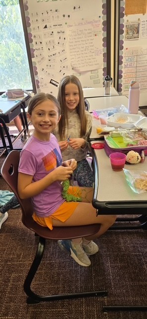 students at the crochet lunch club