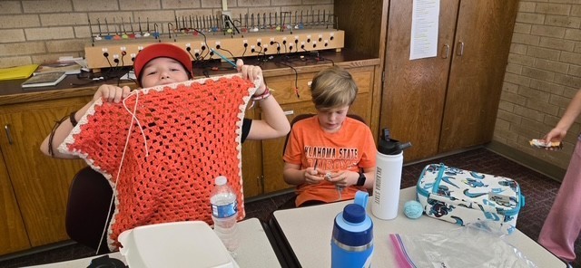 students at the crochet lunch club