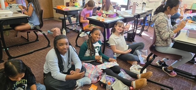students at the crochet lunch club