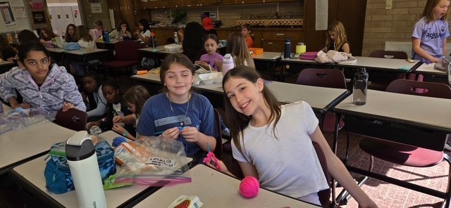 students at the crochet lunch club