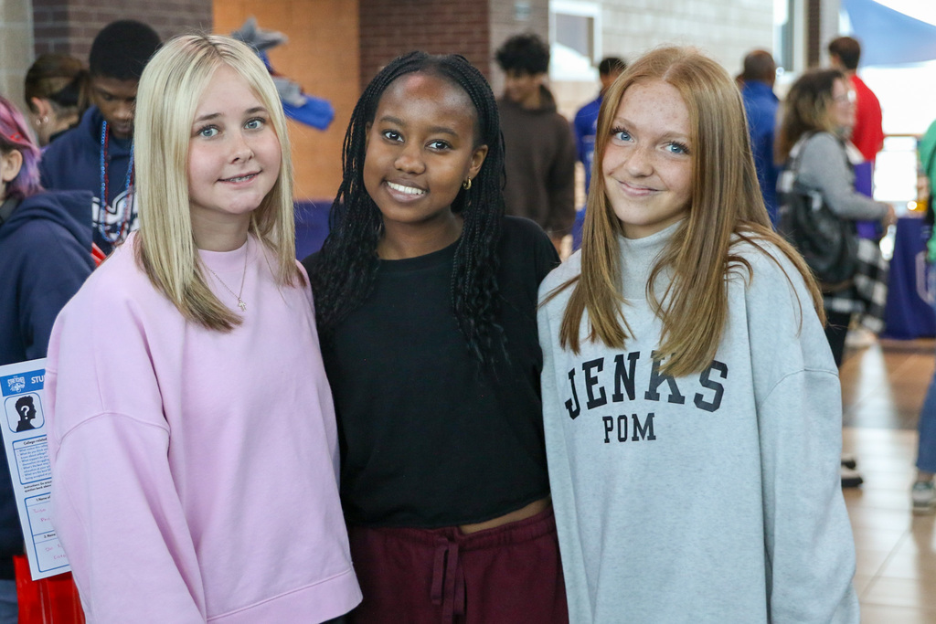 three jenks girls smiling for a photo 