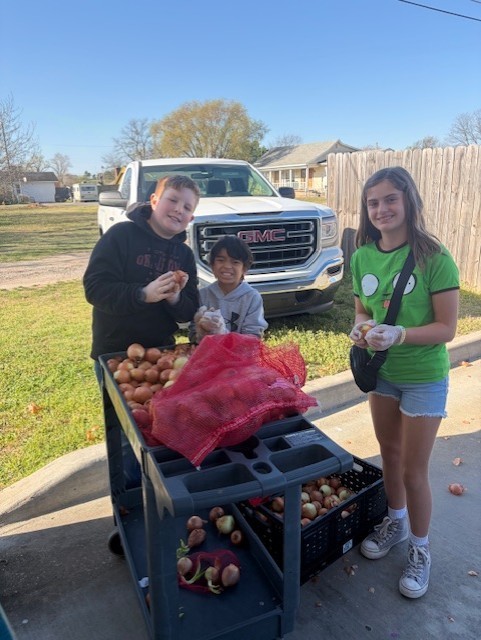 5th grade class food drive winner at the Jenks food bank