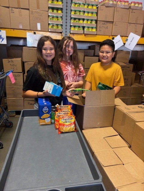 5th grade class food drive winner at the Jenks food bank