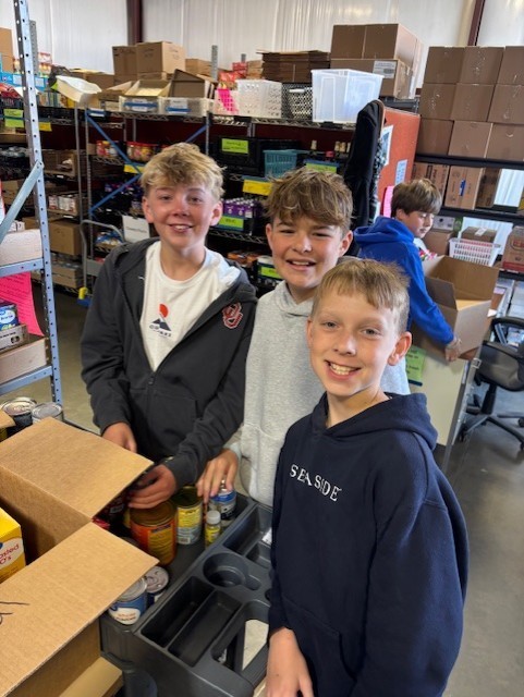 6th Grade students at the Jenks Community Food Bank