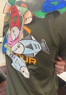 fish on a student's back