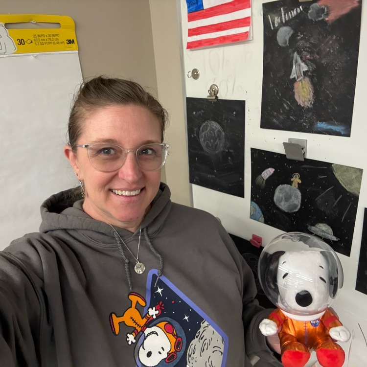 Mrs Gonzalez with Snoopy astronaut 