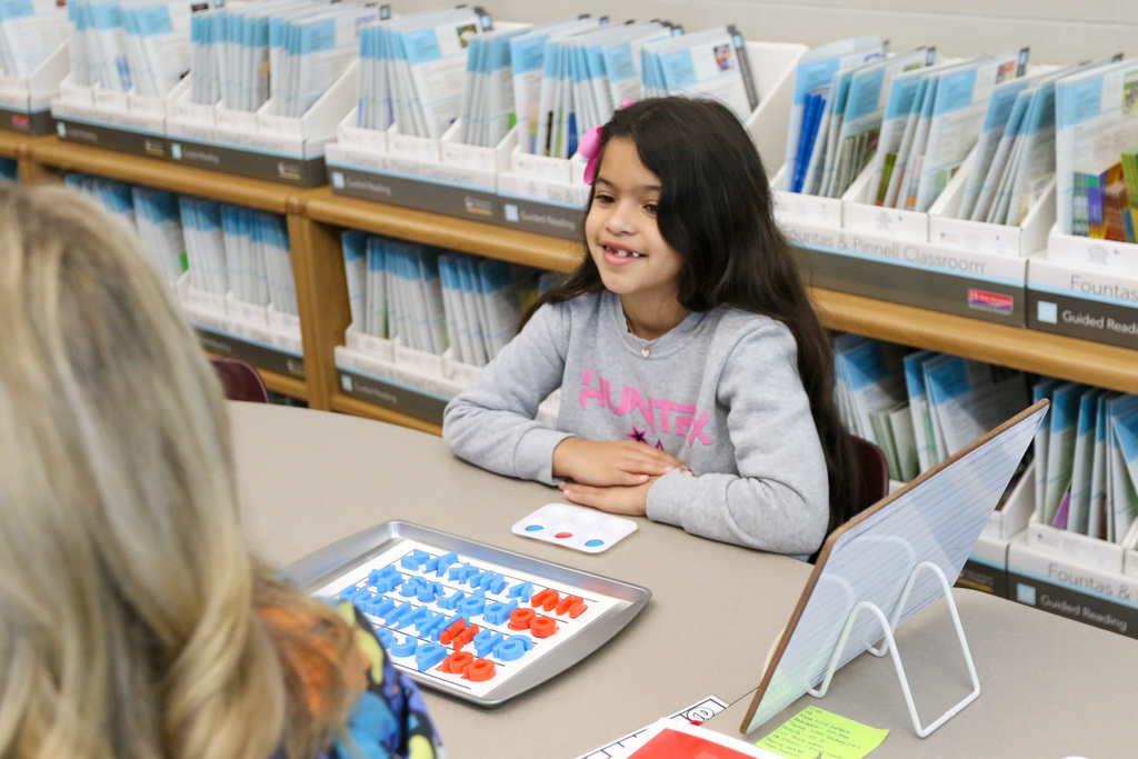student smiling at ms. smith