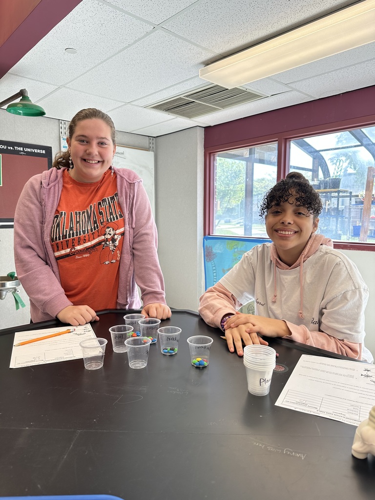 2 students doing science lab