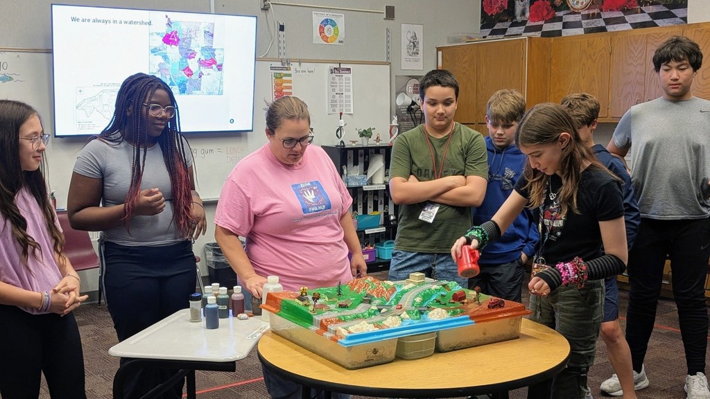 students working with a water table