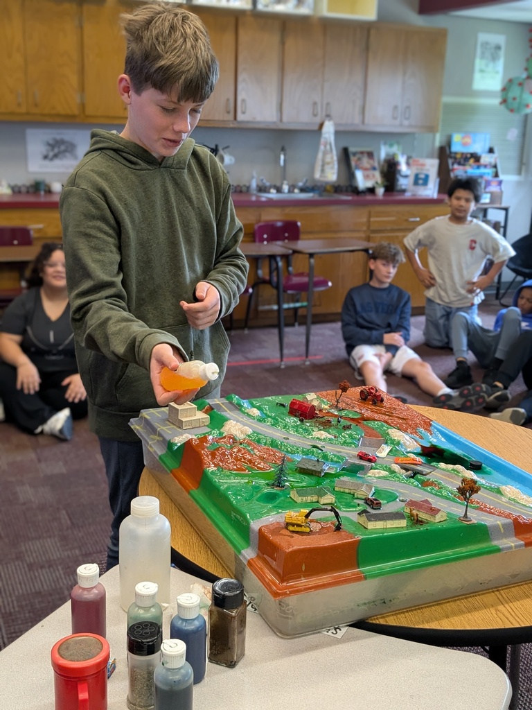 student working with a science experiment