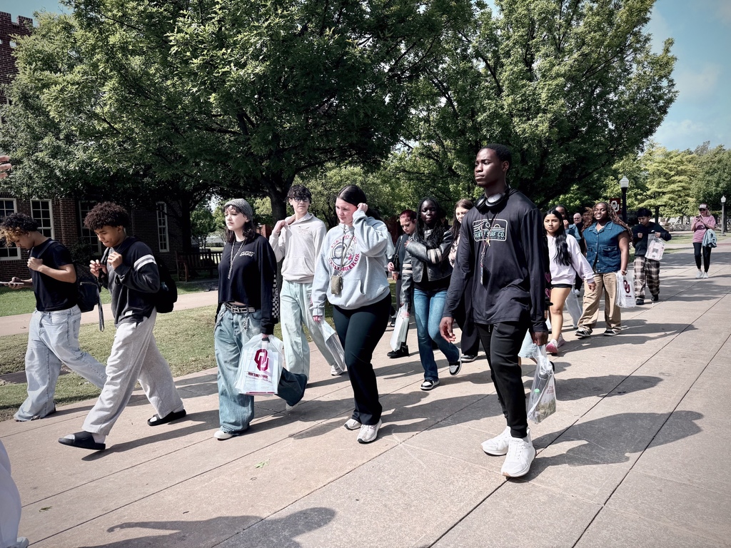 AVID students from Jenks High School walking during campus tour at University of Oklahoma