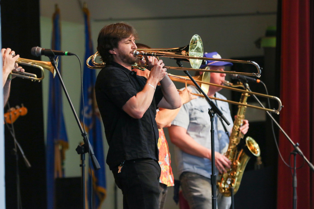 member of the band playing a trombone.
