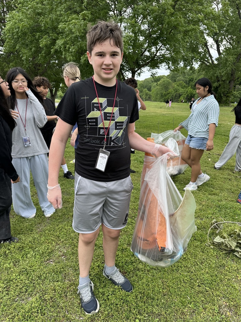 Student picking up trash