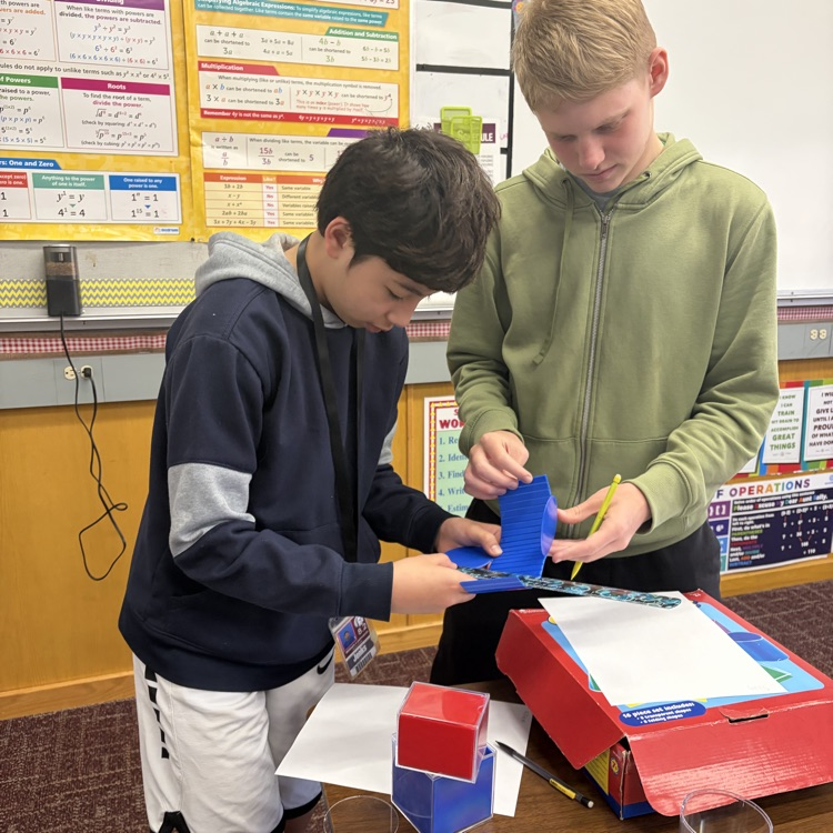 students measuring 