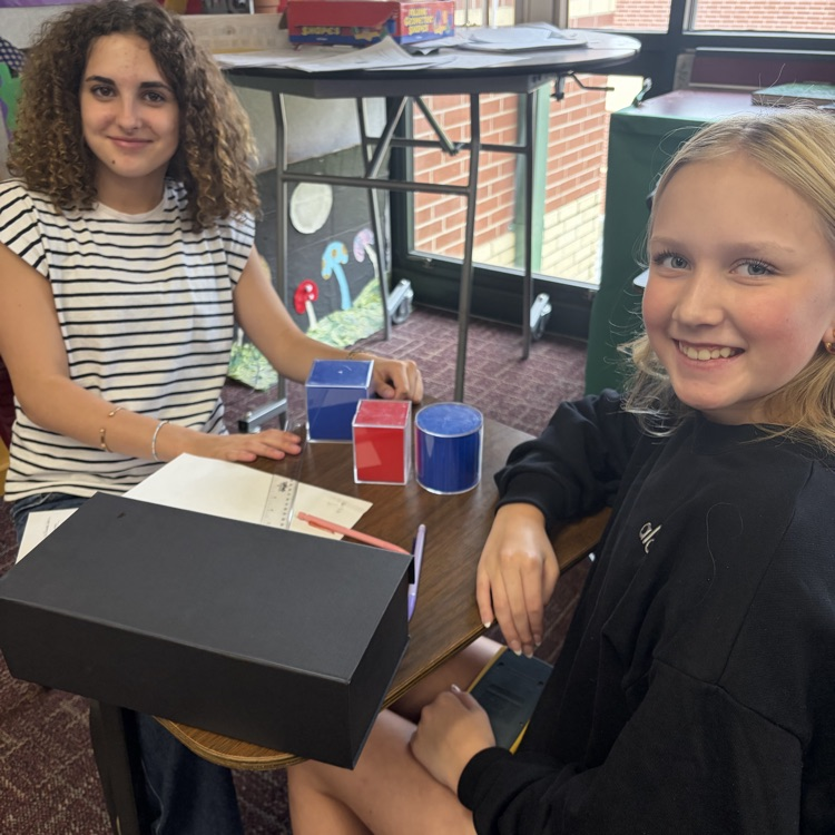 students measuring 
