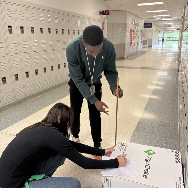 students measuring 