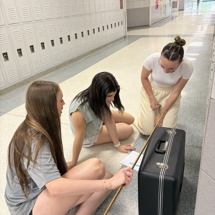 students measuring 