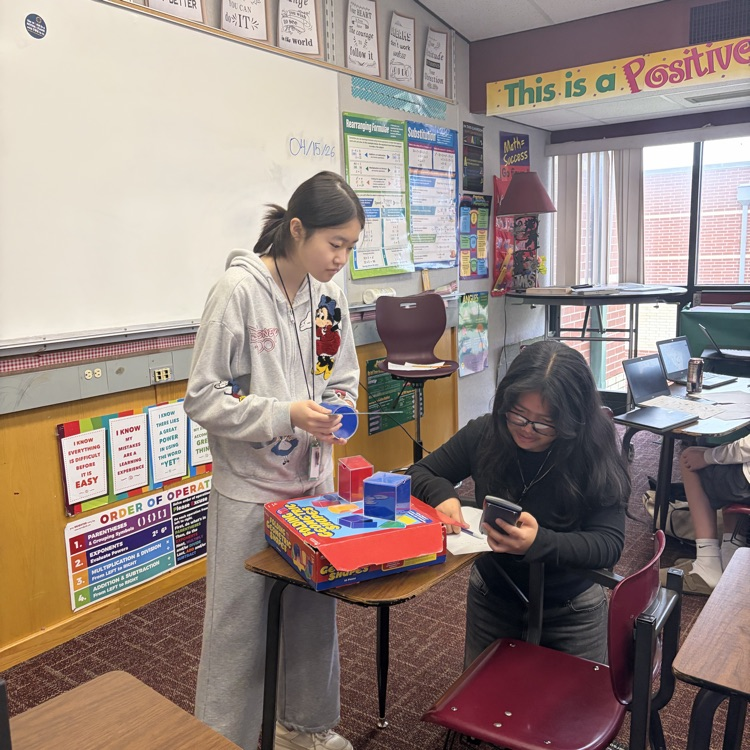 students measuring 