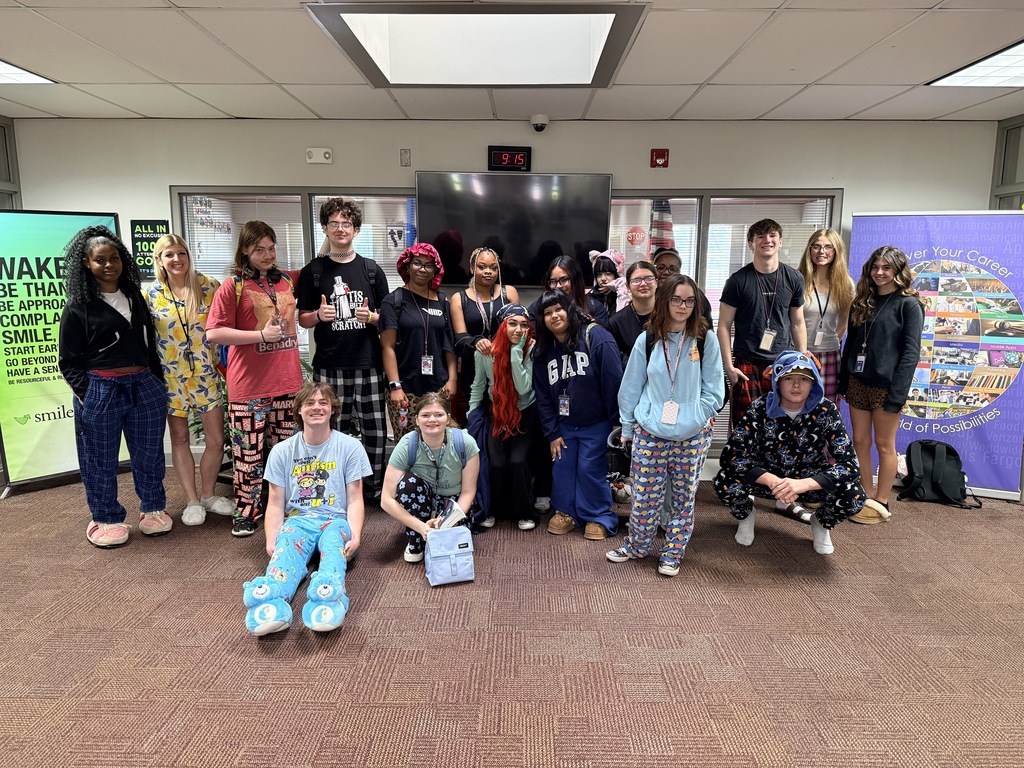 Assorted students and staff wearing pajamas 