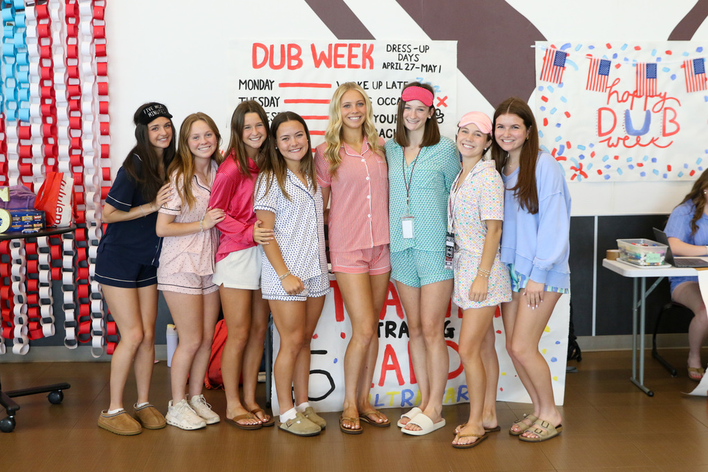 eight girls in their pajamas dressed up as todays theme woke up late