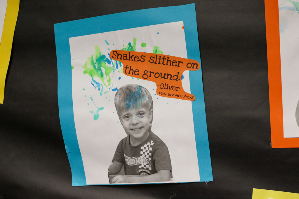 Photo of a little boy with a quote that says snakes slither on the ground - oliver