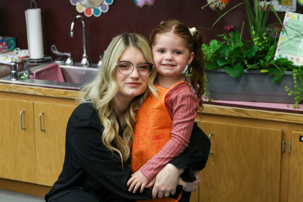 photo of mom and daughter smiling