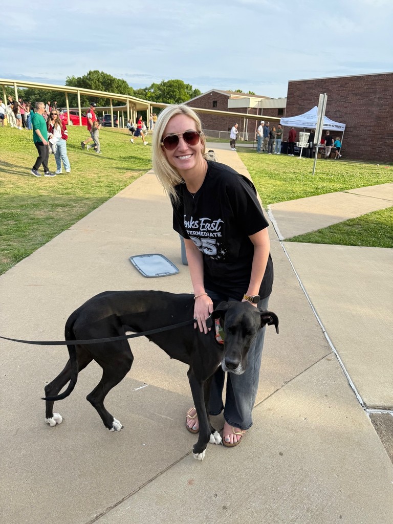 Jacki Taylor with a dog who came to the Celebration of Learning